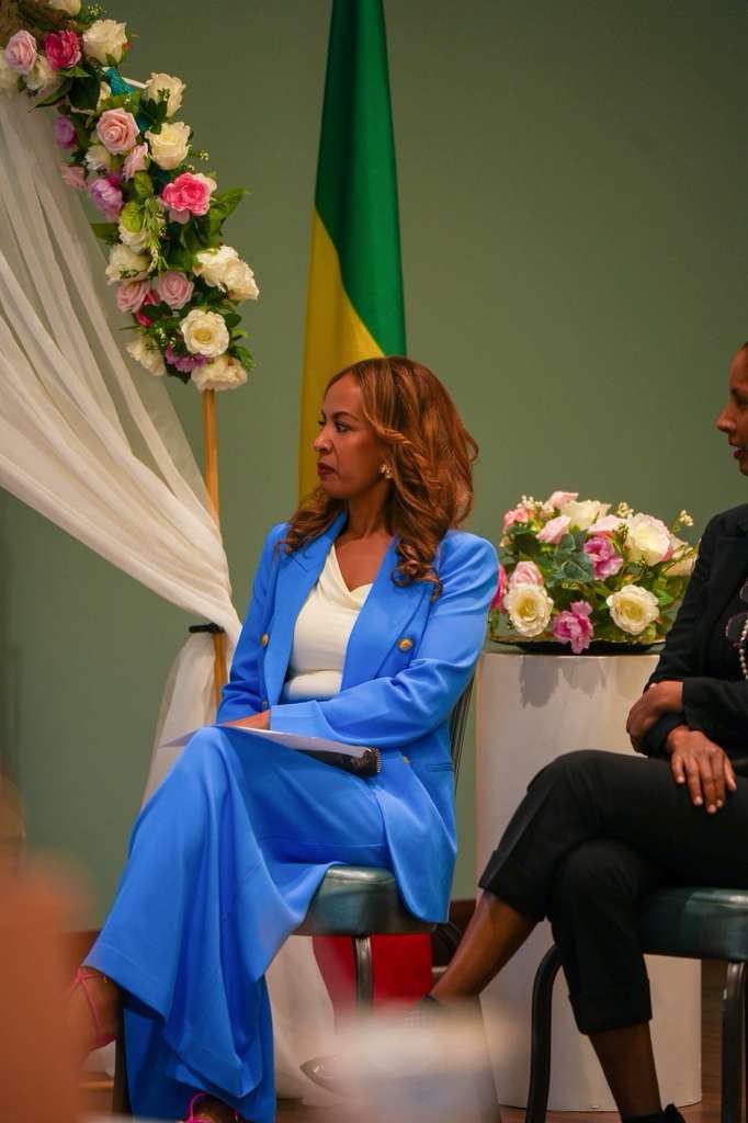 A panelist listens during the empowerment conversation.