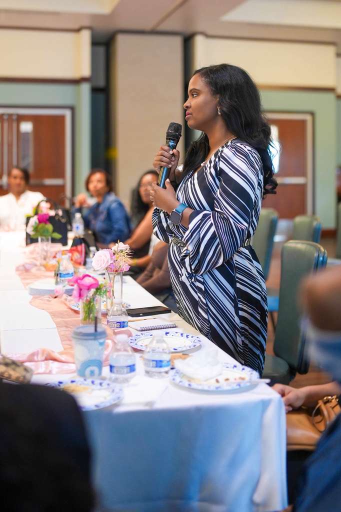 A business owner presents wellness and beauty products.
